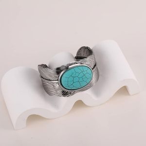 FAUX TURQUOISE FEATHER CUFF BRACELET
